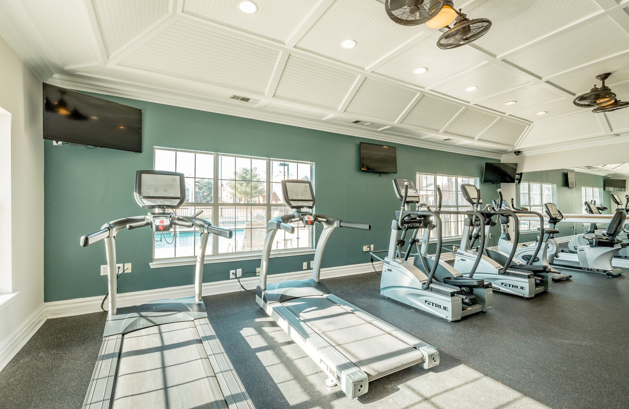 Hawthorne Park South resident fitness center with cardio and weight machines